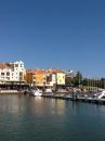 Portugal - Vilamoura Marina - May 2015: The view across our pontoon to the marina restaurants and pubs.

